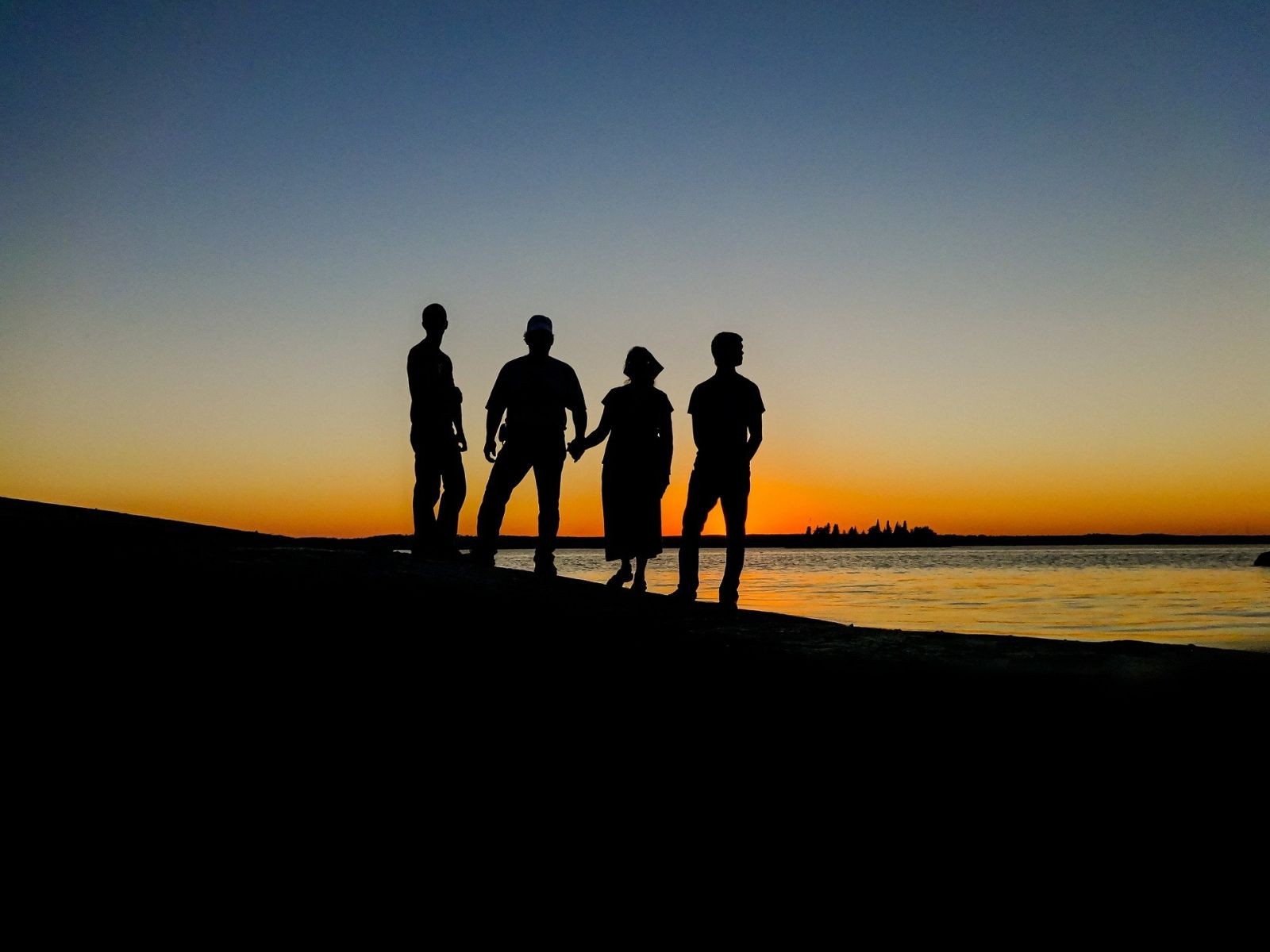Group of People Enjoying the Sunset